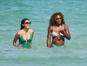 Serena Williams shows off her bikini body while on holiday with friends