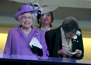 Queen Elizabeth II celebrates winning the Gold Cup at Royal Ascot