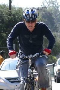 Steve Martin rides his bike