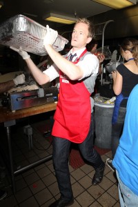 Neil Patrick Harris assists in food preparation at the LA Mission's Annual Thanksgiving for the Homeless at the Los Angeles Mission