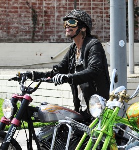 Steven Tyler seen cruising around Hollywood Boulevard on his custom motorcycle