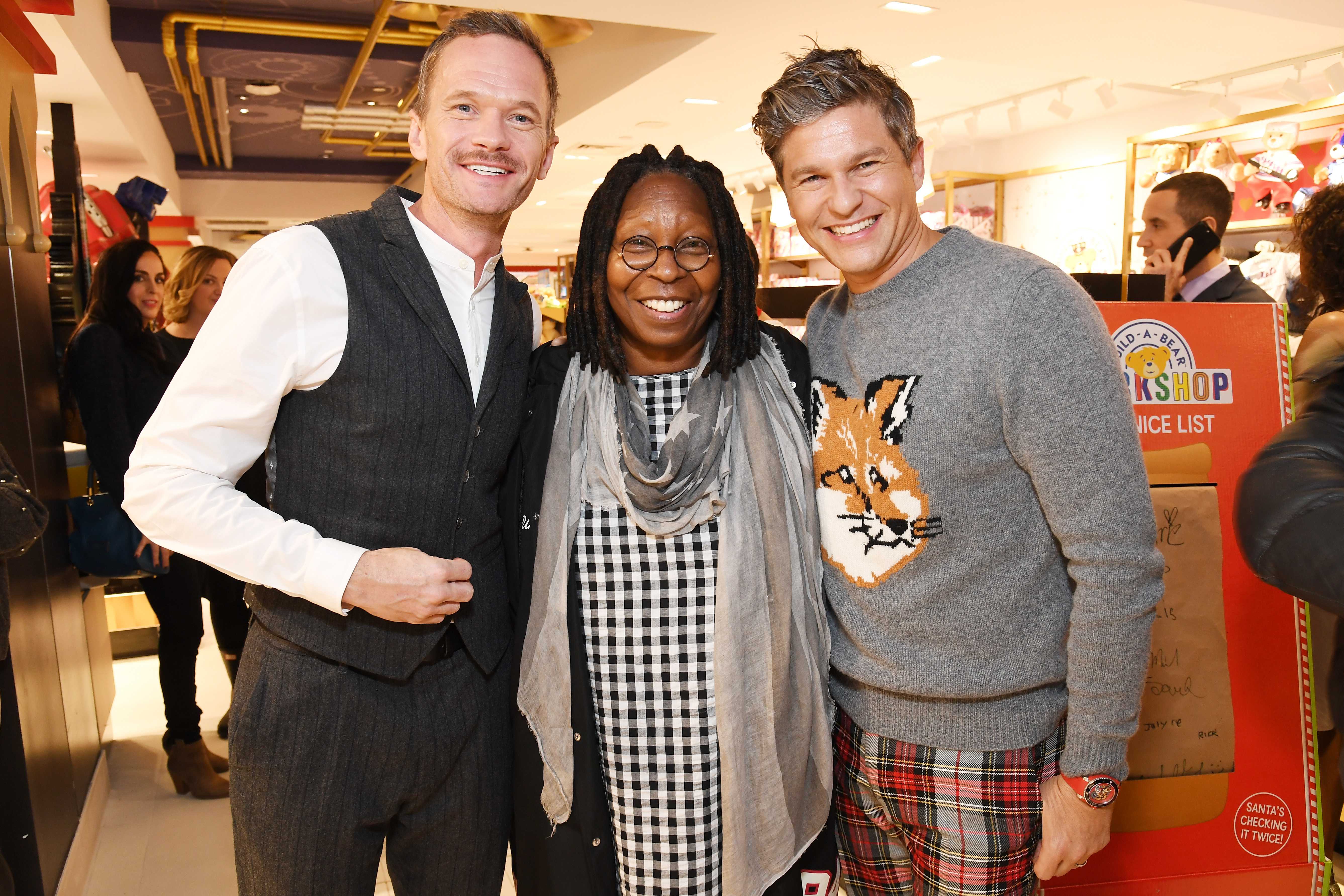 Neil Patrick Harris-Whoopi Goldberg-David Burtka-FAO Schwarz flagship-30 Rockfeller Plaza-new york gossip gal