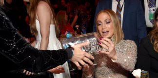 Bulleit celebrates Jennifer Lopez,limited edition Bulleit NEON Bottle piece created by neon artist Lisa Schulte,2020 Film Independent Spirit Awards,santa Monica, California,new york gossip gal